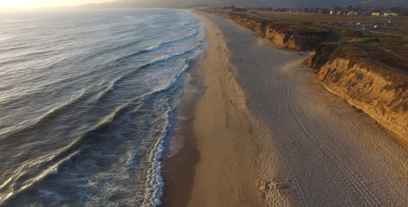 Flying Over Sandy Beach