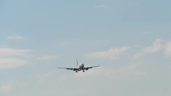 Airplane Approaching Over Ocean