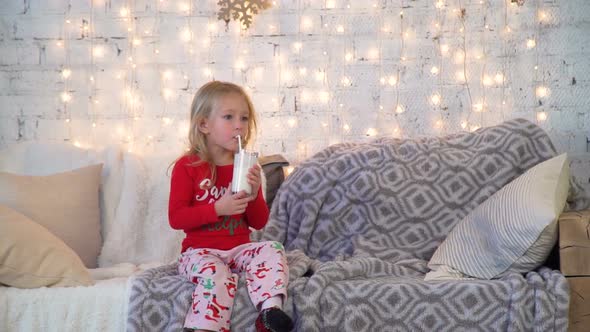 Little Girl Drinking a Milkshake