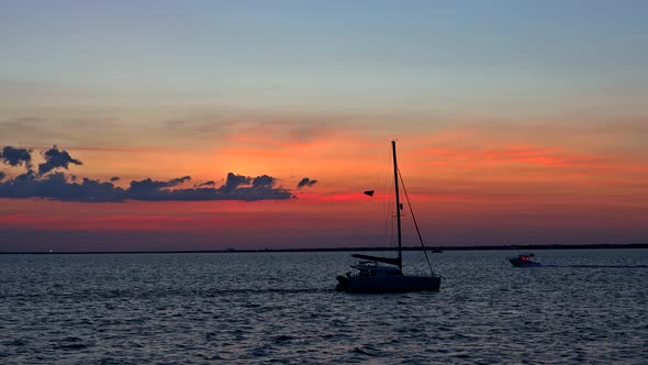 Holiday Lifestyle Landscape with Skyline Yacht Sailing Against Sunset Sailboat Tourism Maritime