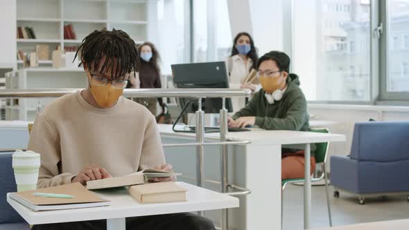 University People Studying in Library