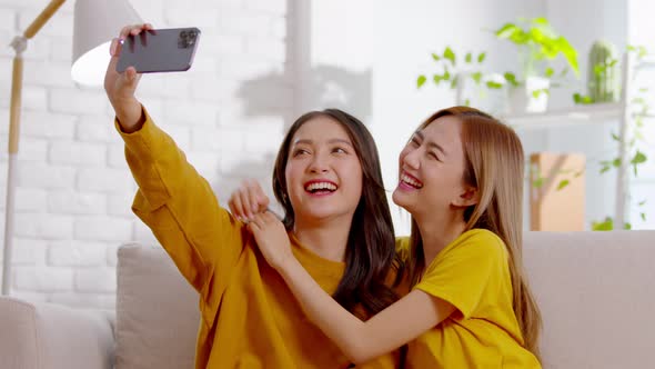 Young Asian women couple is taking a picture together.LGBTQ couple