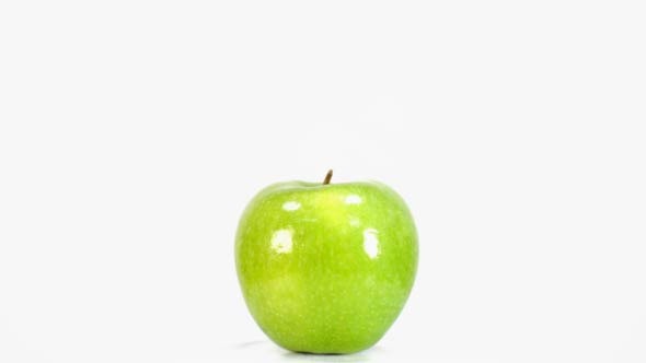 Rotating Green Apple