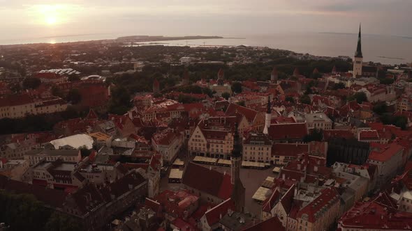 Beautiful Aerial Drone Shot of Old Town of Tallinn Estonia at Sunset