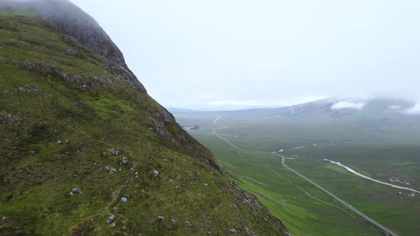 A large mountain in Scotland revealed in cold cloudy conditions