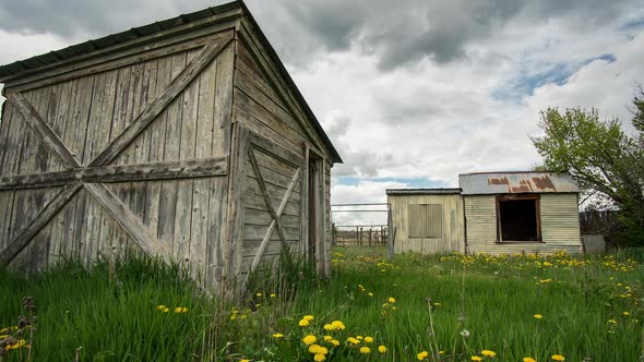 Time lapse of old wood sheds in the country