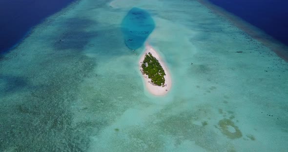 Wide angle drone abstract shot of a paradise sunny white sand beach and turquoise sea background in 