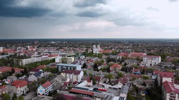 Aerial top down view of Sombor town in Vojvodina, Serbia, St. Stefan Cathedral, beautiful moody sky