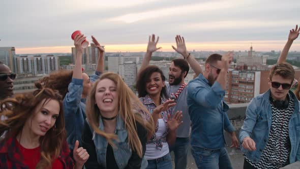 Happy Diverse Clubbers on Rooftop