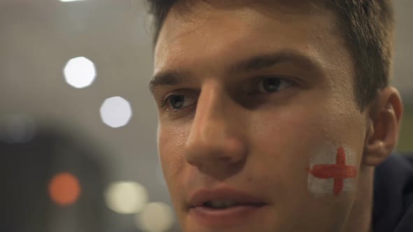 Crazy Eyes of Football Fan Watching Match, Rejoices at Goal Scored, Closeup