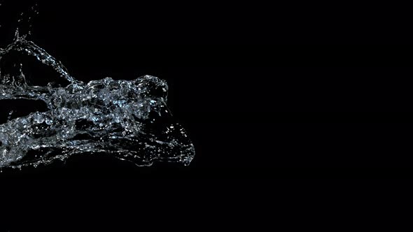 Super Slow Motion Shot of Water Splash Isolated on Black Background at 1000Fps