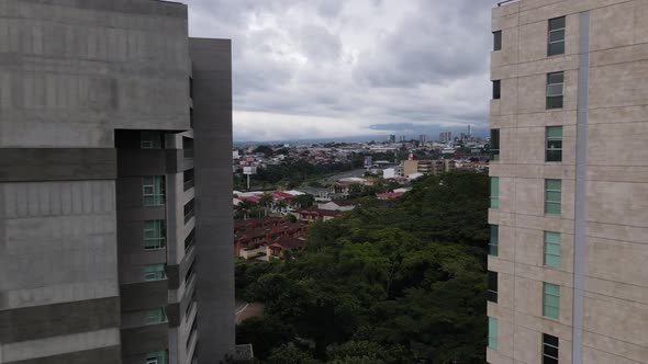 Drone shot flying between buildings in the city of San Jose, Costa Rica