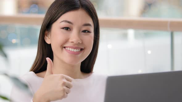 Portrait Happy Asian Business Woman Portrait Posing Workplace Showing Cool Thumb Up Gesture Smiling