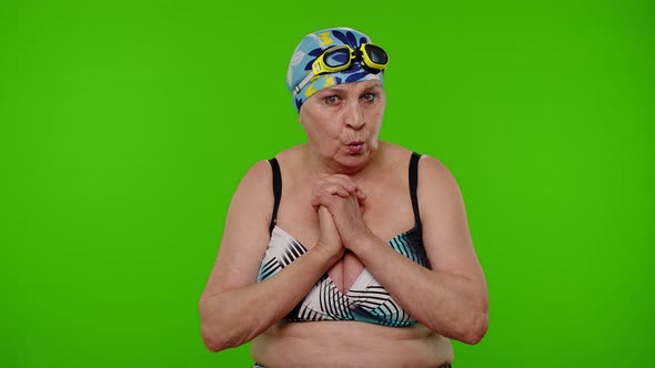 Senior Pensioner Woman Swimmer in Swimsuit Bra Expresses Rage and Being Irritated Negative Emotions