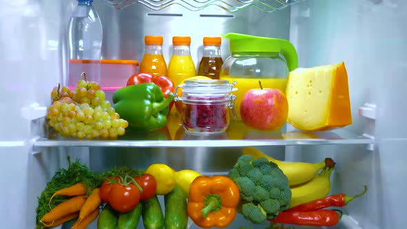 Open Refrigerator Filled with Food