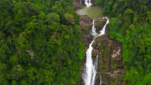 Waterfall in the Tropical Mountain Jungle