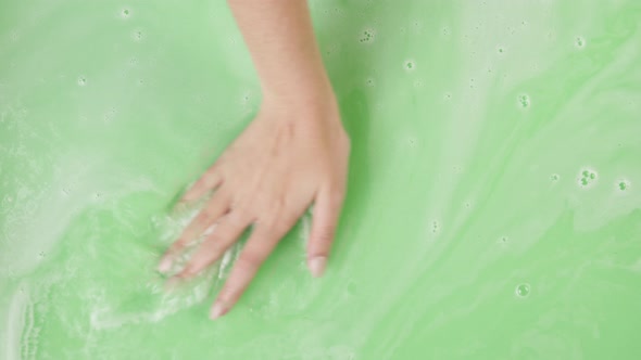 Hands Mixing Paints Closeup Dissolved Bath Bomb