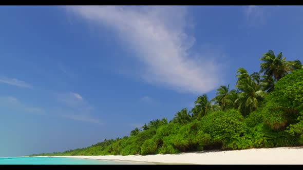 Aerial drone view tourism of exotic tourist beach time by aqua blue lagoon with white sandy backgrou