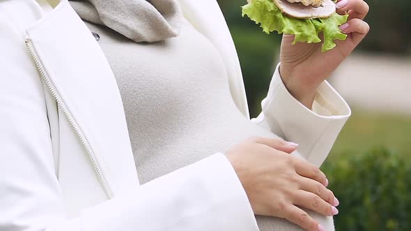 Hungry Pregnant Lady Eating Meat Burger, Having Healthy Appetite, Lunchtime