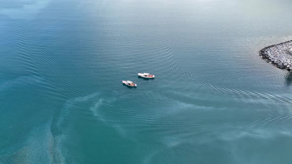 Fishing boat goeas to sea aerial view Turkey Alanya 4 K