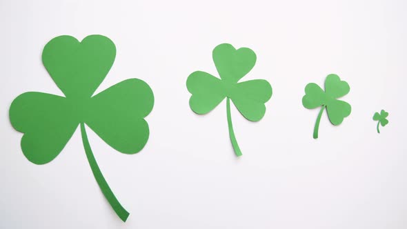 Green Paper Shamrock on White Background 