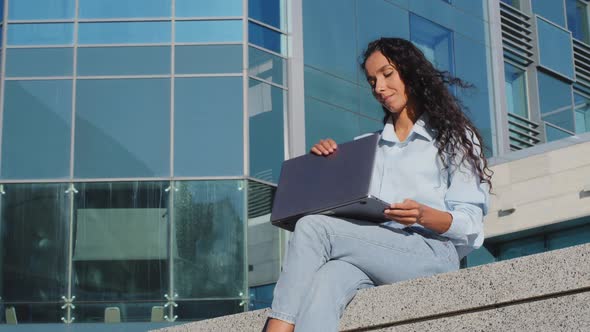 Portrait of Business Woman Finishing Work Studying Sitting in City Outdoors