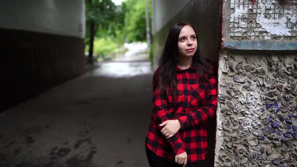 Young Woman in Casual Clothes on the Street.