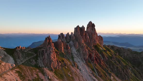 Dolomites mountains peaks on a summer sunrise