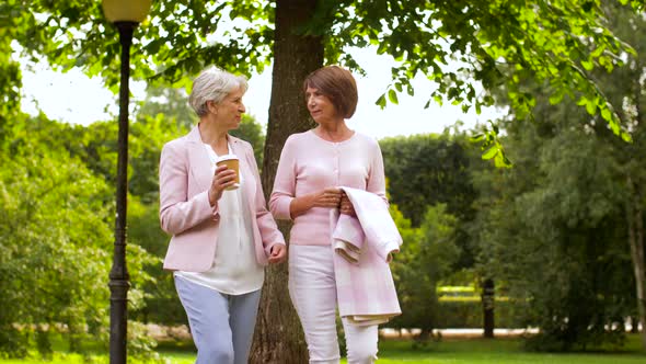 Senior Women or Friends Drinking Coffee at Park