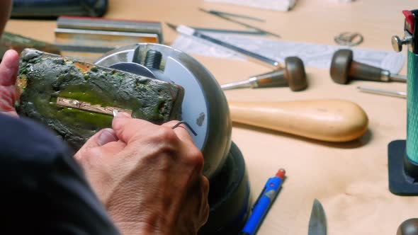 Craftswoman working in workshop