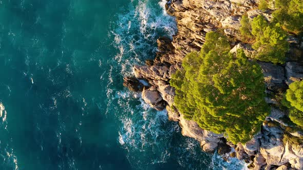 Croatia. Aerial view on rocks and forest. Vacation and adventure. Rocks and turquoise water.