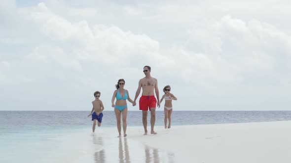 Family on Cloudy Beach Day