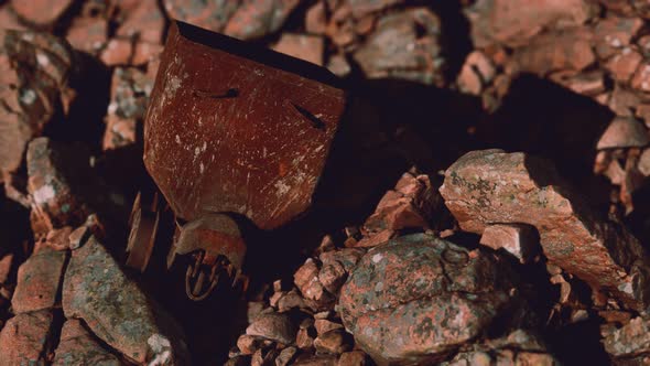 Abandoned Rusty Mine Cart on Rocks alt