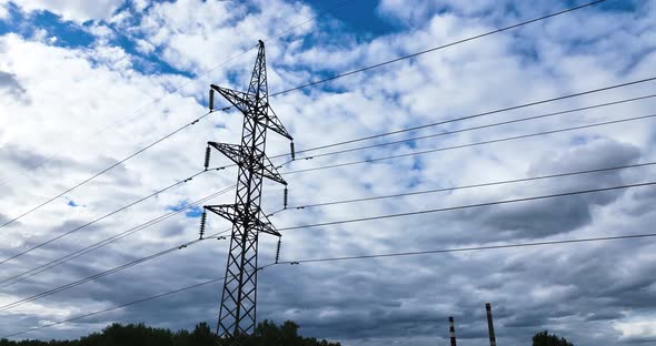 Power line pylon against the background of the sky. Aerial view