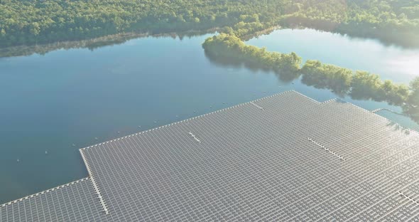 Aerial view of Floating solar panels cell platform system park farm