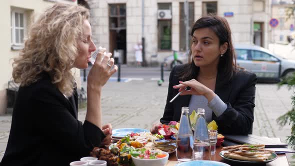 Business Meeting of Two Business Ladies Over a Quick Lunch