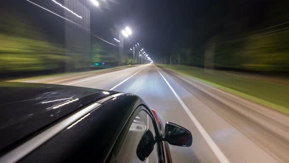 Drivelapse From Top Side of Car Moving on a Night Highway Timelapse Hyperlapse