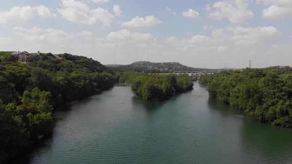 Slowly descending drone shot of redbud isle summer 2020. Located in the capitol of Texas, Austin.