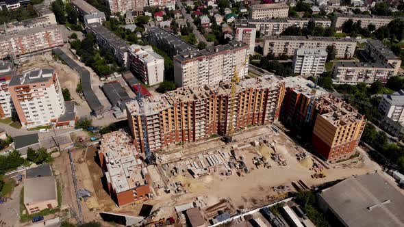 Construction Site with Crane and Building