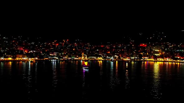 Beautiful Aerial View of the City of Saranda at Night in AlbaniaAlbanian Riviera