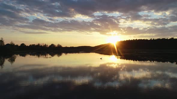 Beautiful Sunset Above Wild Swamp and Forest