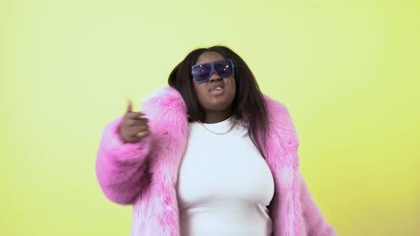 Plus size woman on colored background