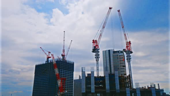Time lapse architecture crane under construction of building alt