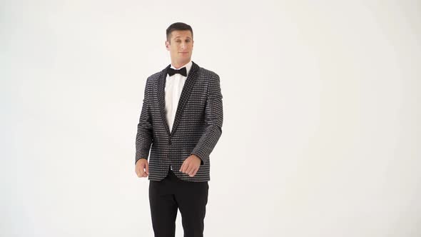 Man in a Checkered Suit With a Bow-tie is Parodying Manners