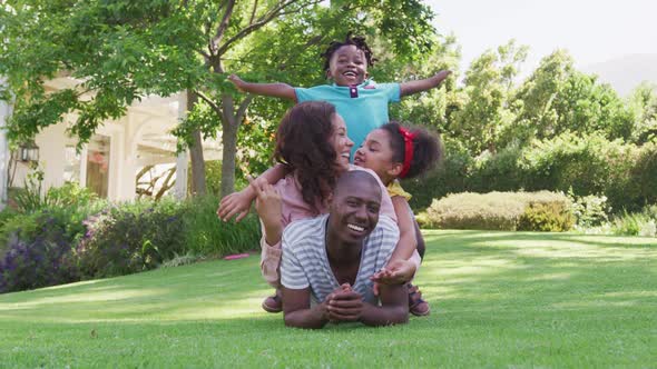 African American family spending time in the garden together