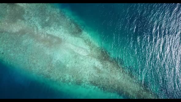 Aerial drone view abstract of tropical coastline beach vacation by blue green ocean with white sandy