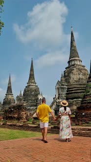 Ayutthaya Thailand at Wat Phra Si Sanphet Couple Men and Women with a Hat Visiting Ayyuthaya