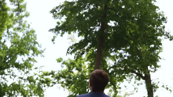 Father Throwing Son in Air Slow Motion