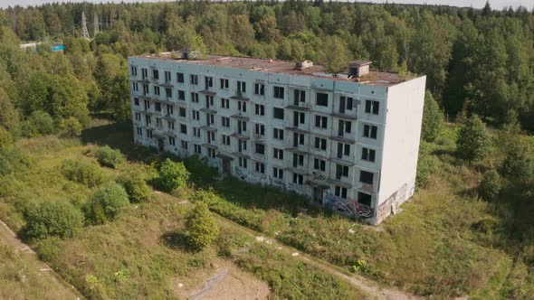 Aerial View of Abandoned and Destroyed Buildings From the Times of the USSR in a Green Picturesque