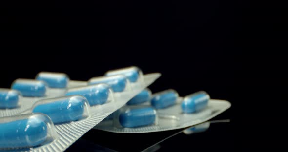 blue diet suplement medicine pills super macro close up 